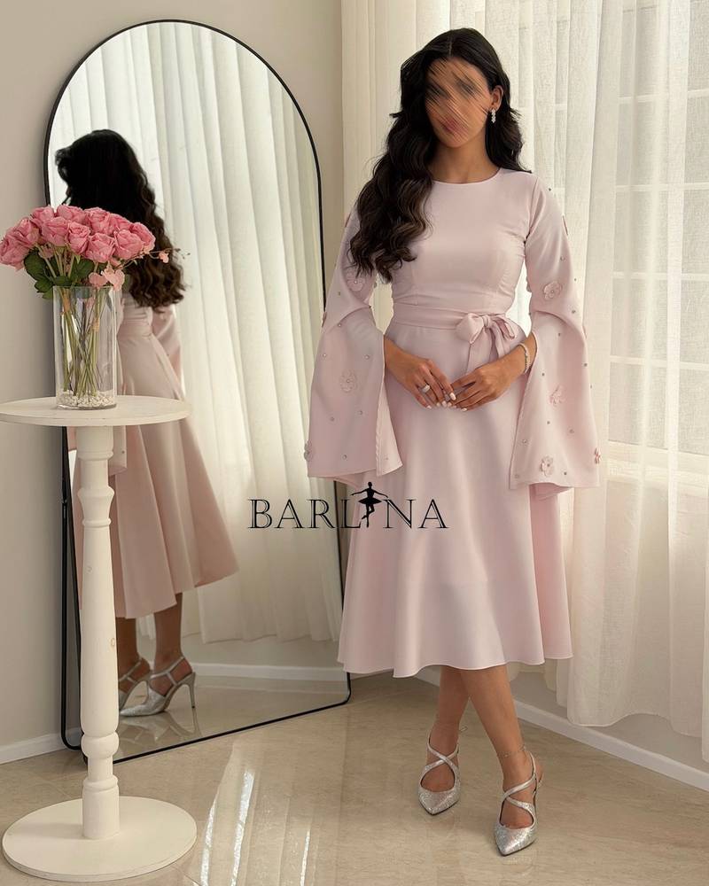 Light pink midi dress with floral sleeves