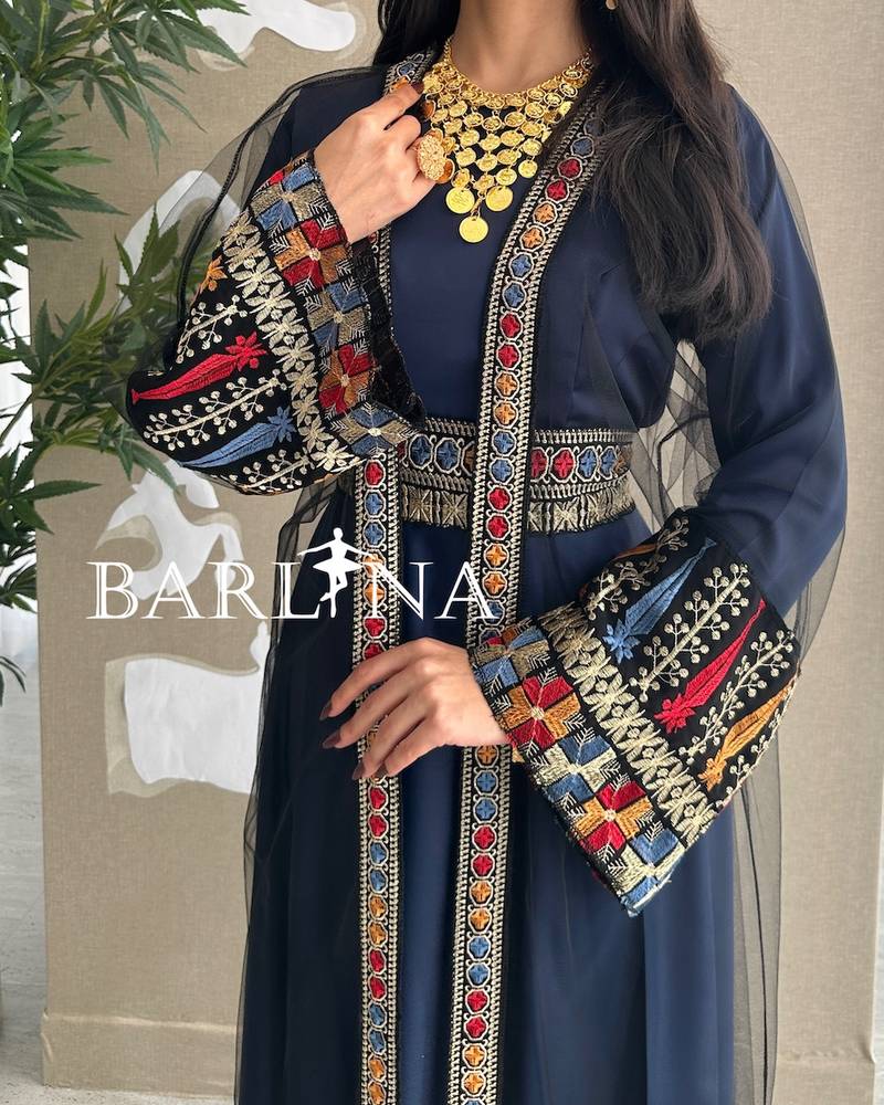 Navy blue jalabiya with colorful traditional embroidery