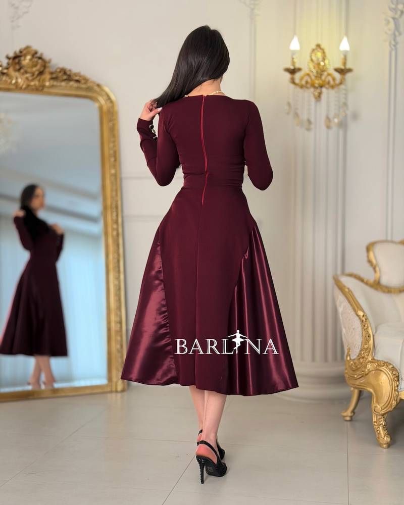 A burgundy midi dress with an elegant