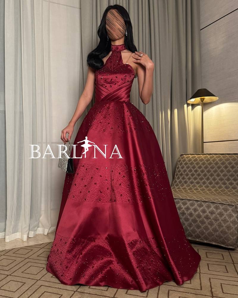 Burgundy evening dress with sequins and halter neck