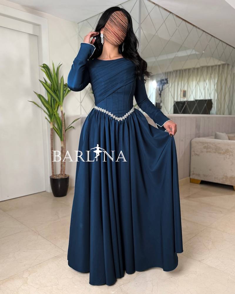Long-sleeved petroleum-colored dress