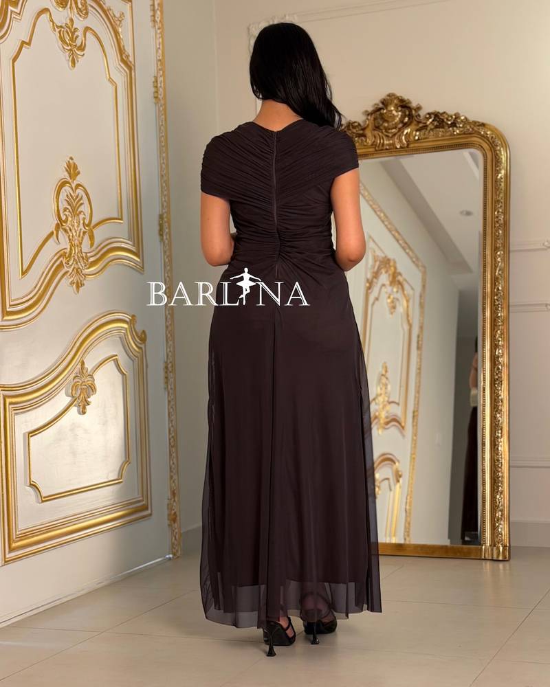 Elegant brown dress with a draped design