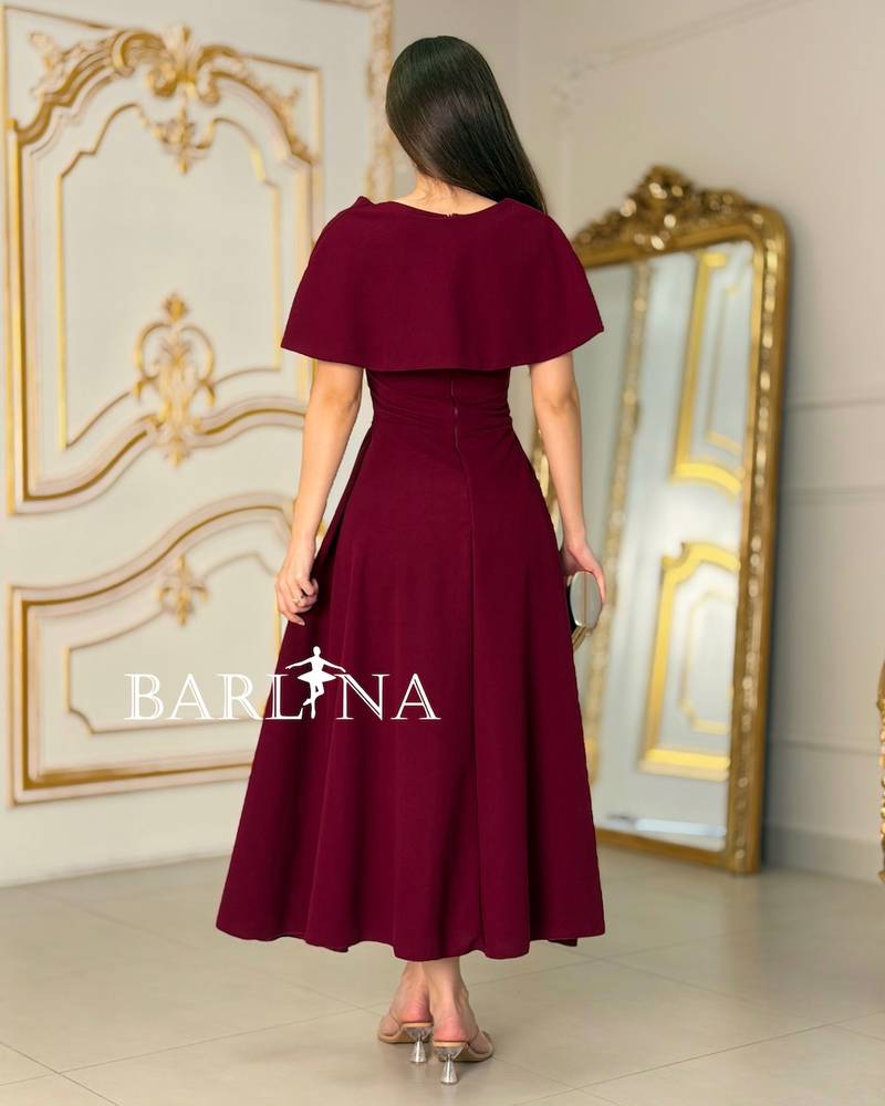 Elegant burgundy dress with a top