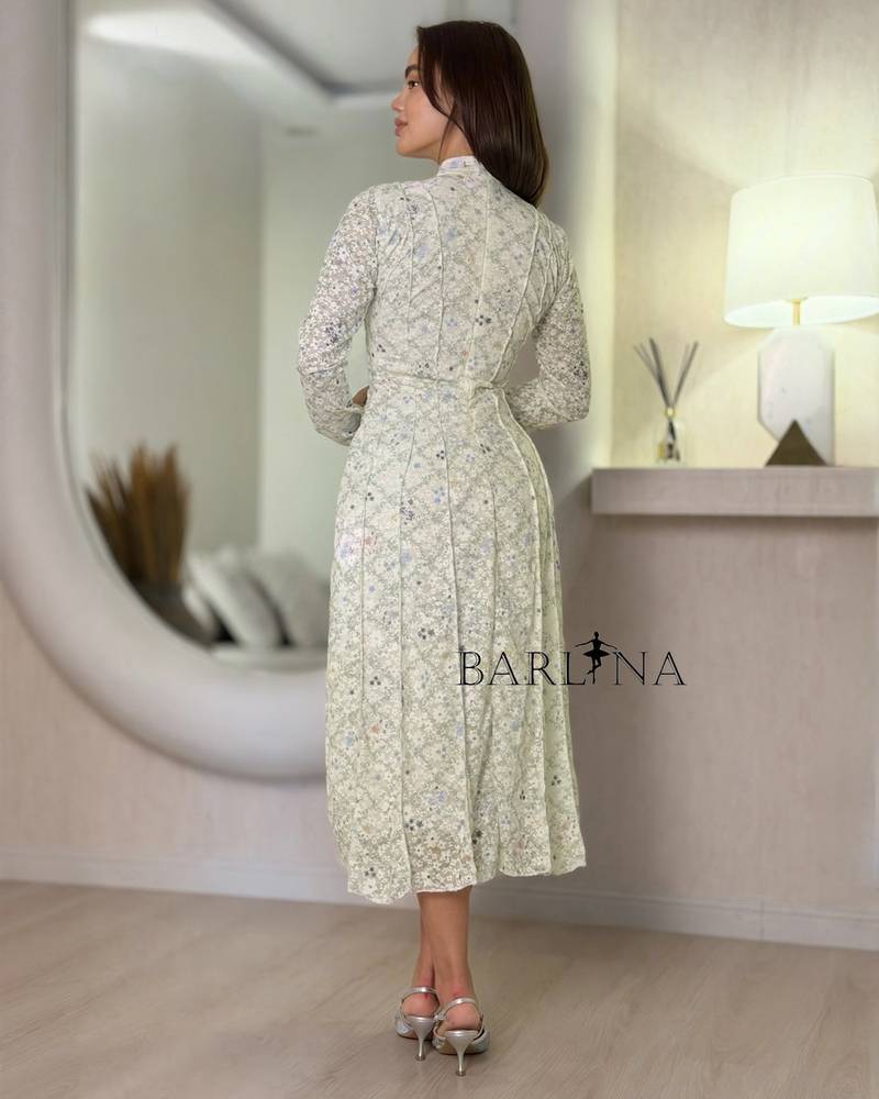 Off-white dress with apple-colored floral print