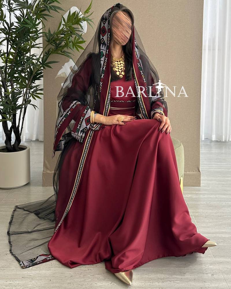 Elegant maroon jalabiya with traditional embroidery