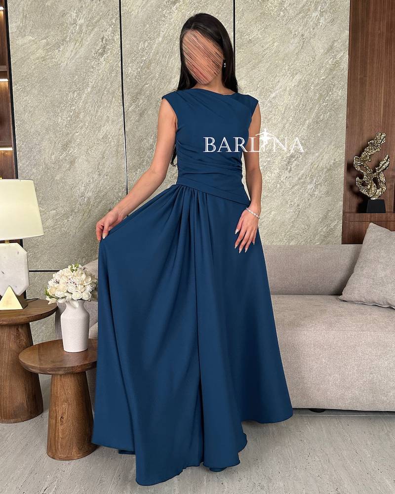 Navy blue dress with ripples at the waist
