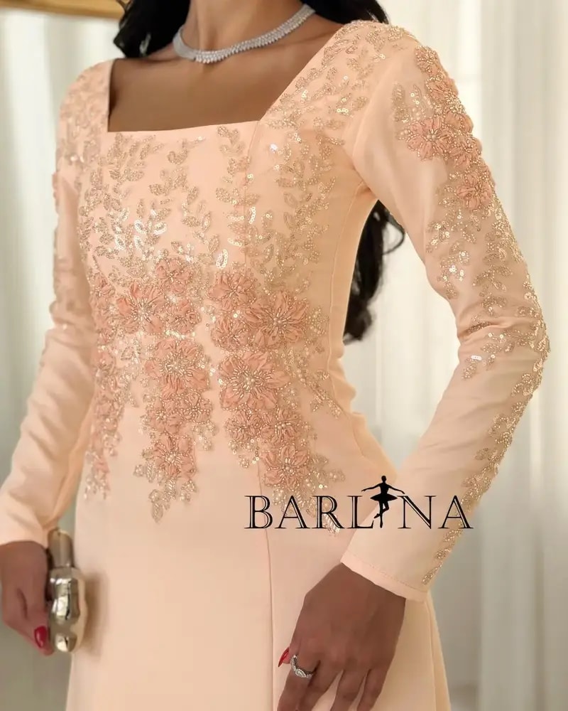 Embroidered melon occasion dress with shimmer details