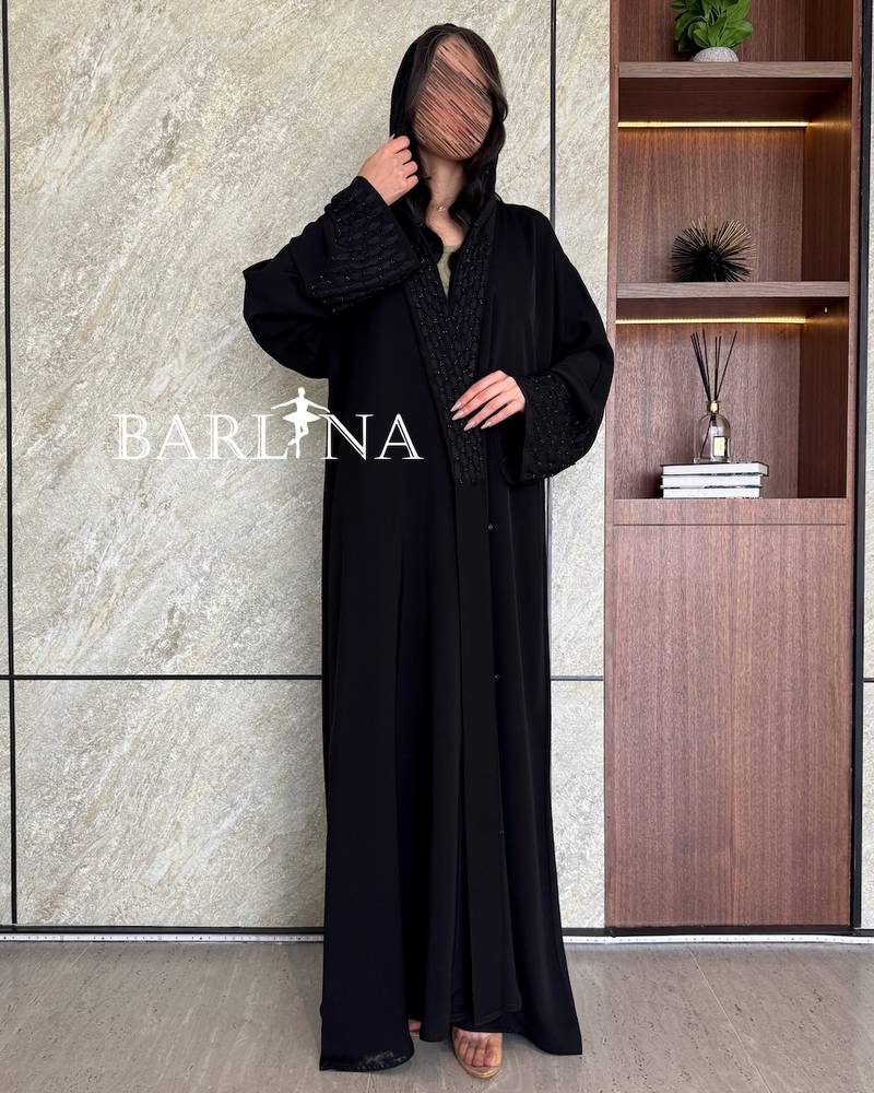 Black abaya embroidered with a royal touch