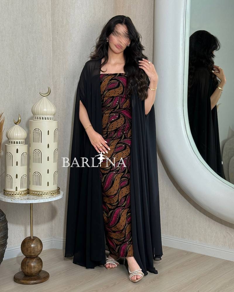 Jalabiya with artistic patterns in shades of brown and burgundy