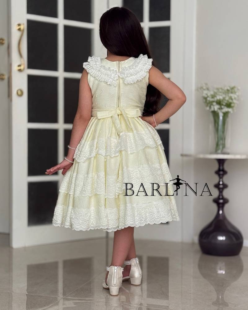 Girls' evening dress adorned with luxurious trim
