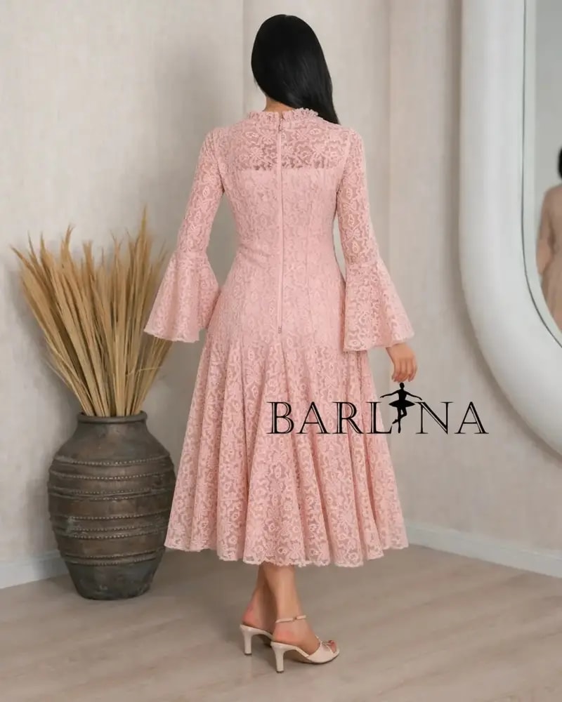 A soft dress adorned with elegant lace patterns
