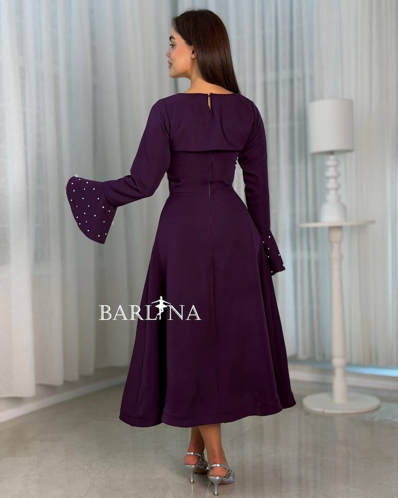 Dark purple two-piece dress with bell sleeves