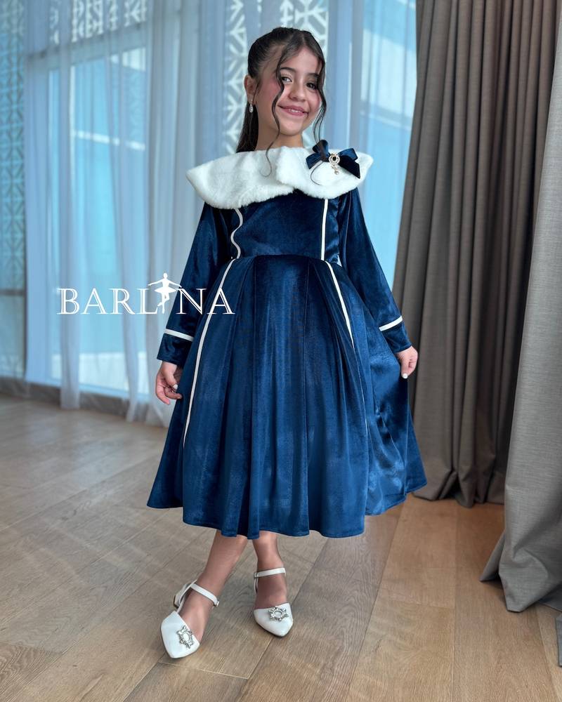 Girls' navy velvet dress with a white fur collar
