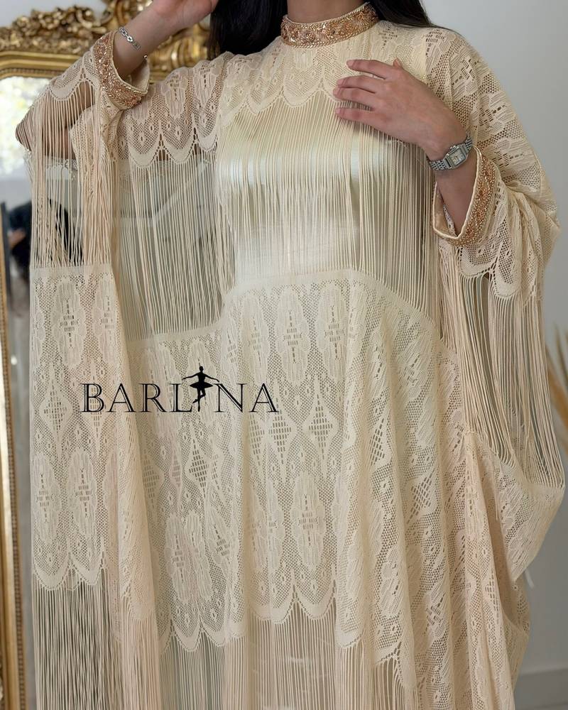 Elegant, wide jalabiya with a bisht design and lace fabric.