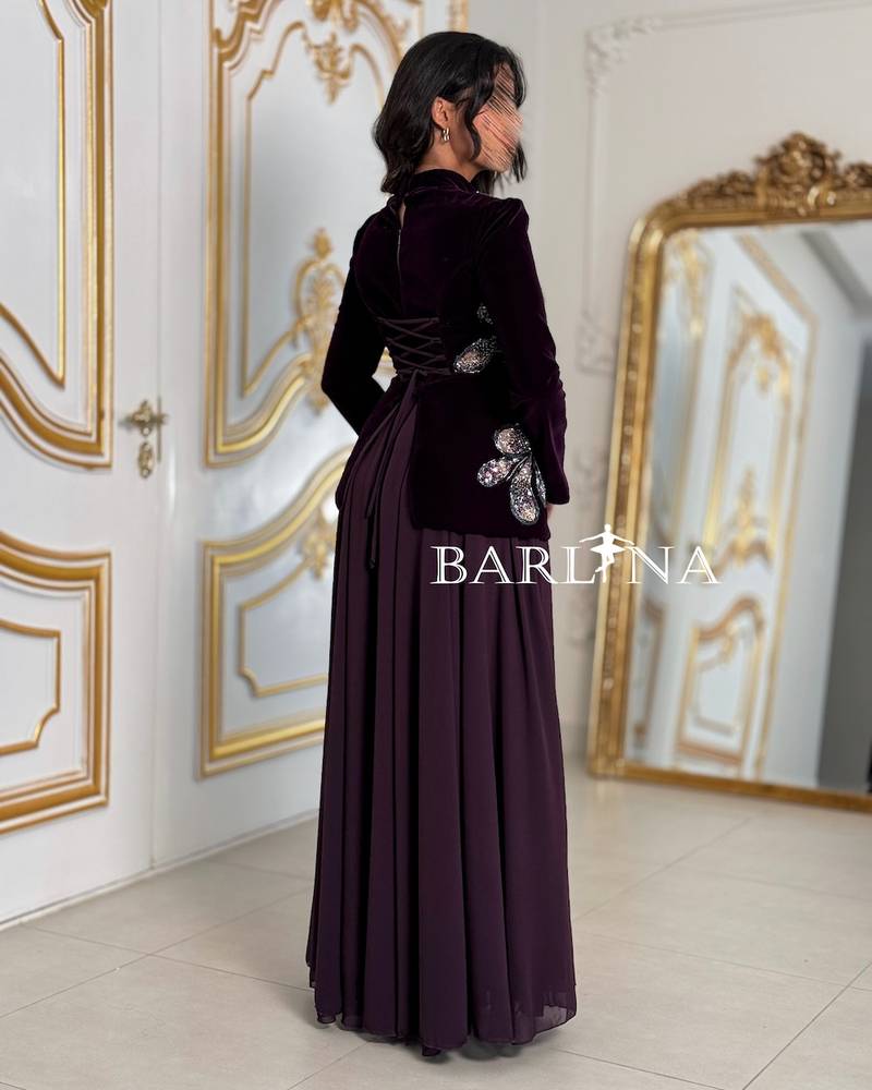 Long dark purple dress with luxurious embroidery