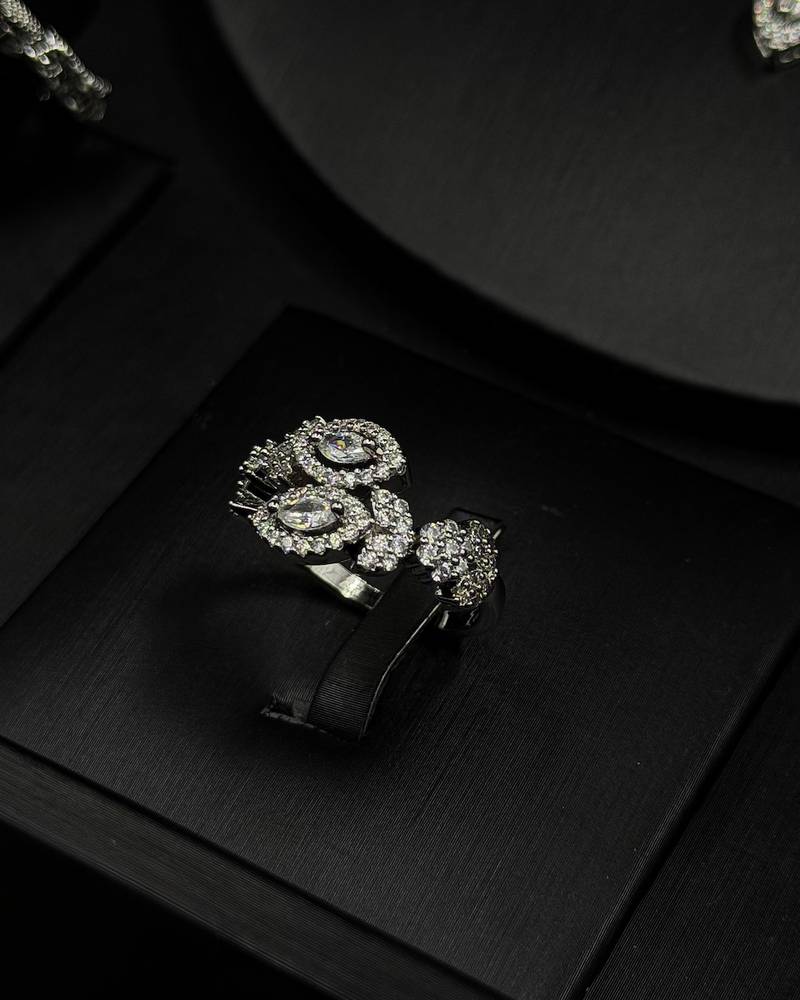 An evening accessory set intricately adorned with diamonds