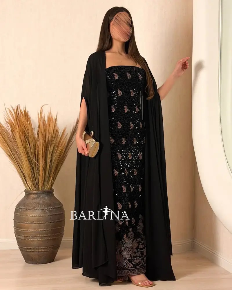 فستان أسود فاخر مزين بتطريز أنيق