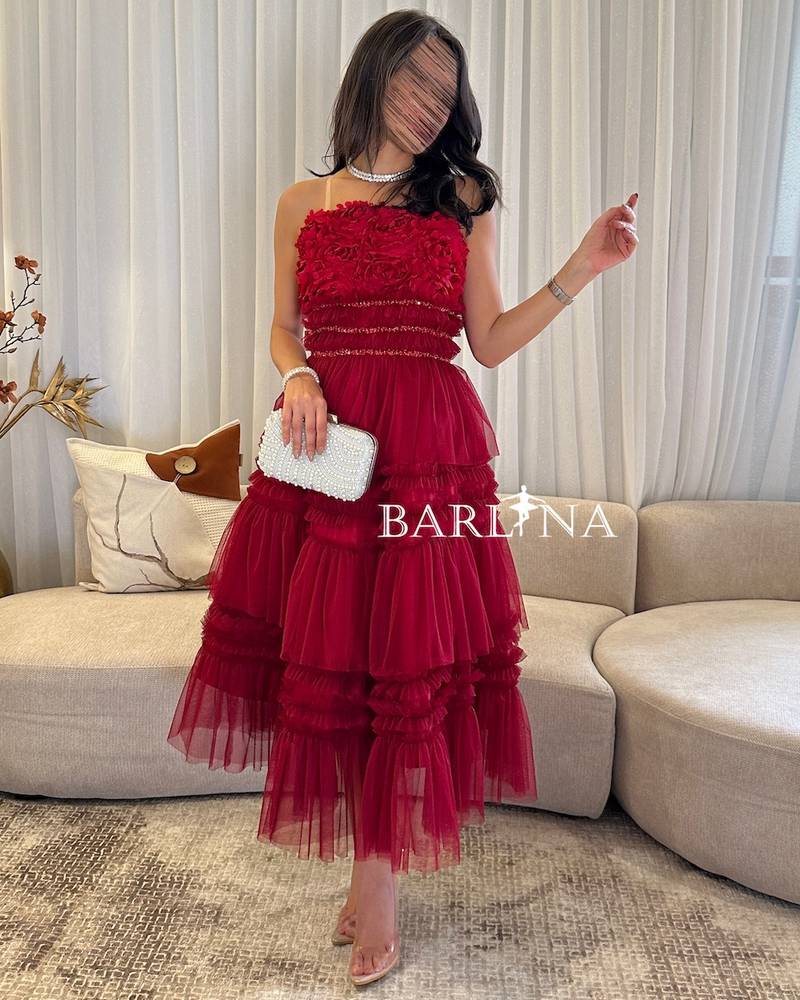 Red tulle dress with prominent roses