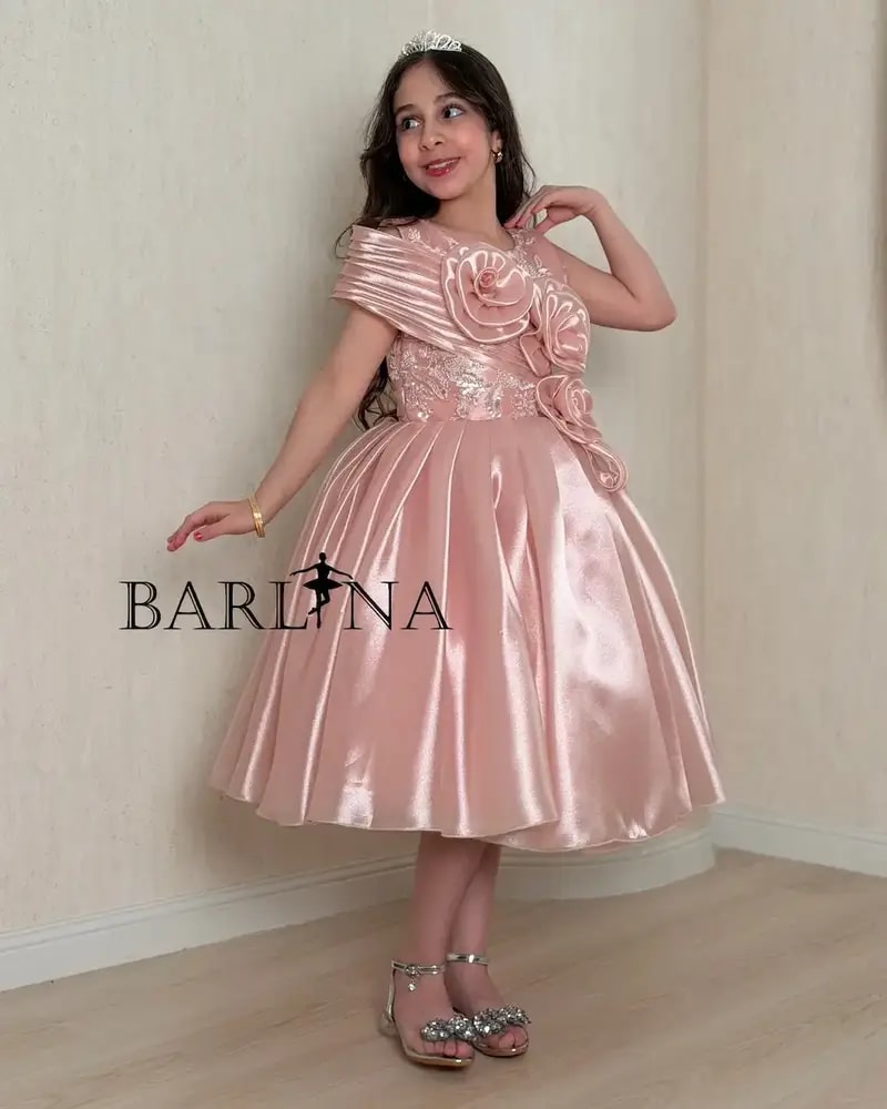 Girls' pink shiny dress with large roses