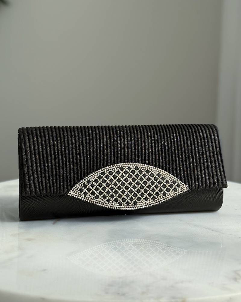 A bag decorated with a front panel made of rhinestones
