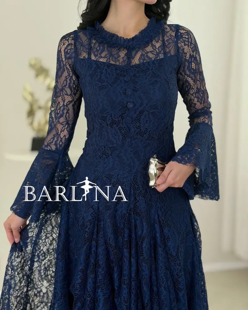 A soft dress adorned with elegant lace patterns