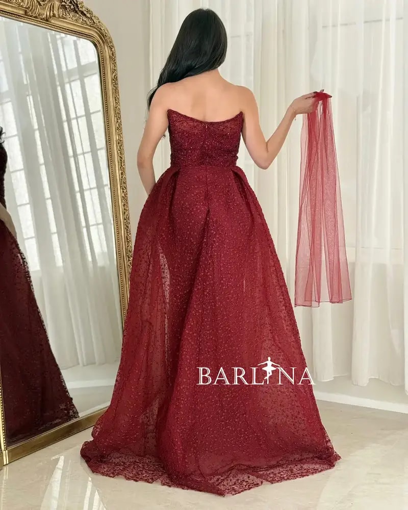 Burgundy embroidered evening dress with an elegant shawl