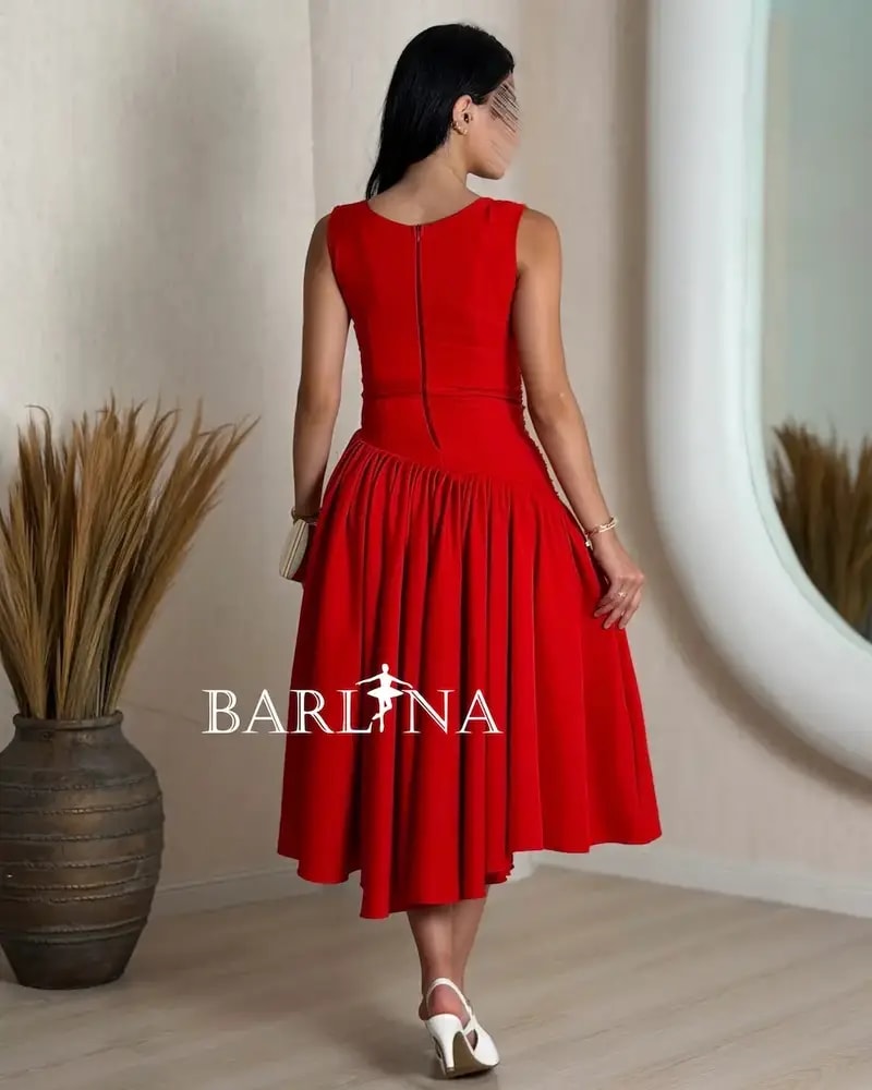 Soft midi dress with a sequined bodice