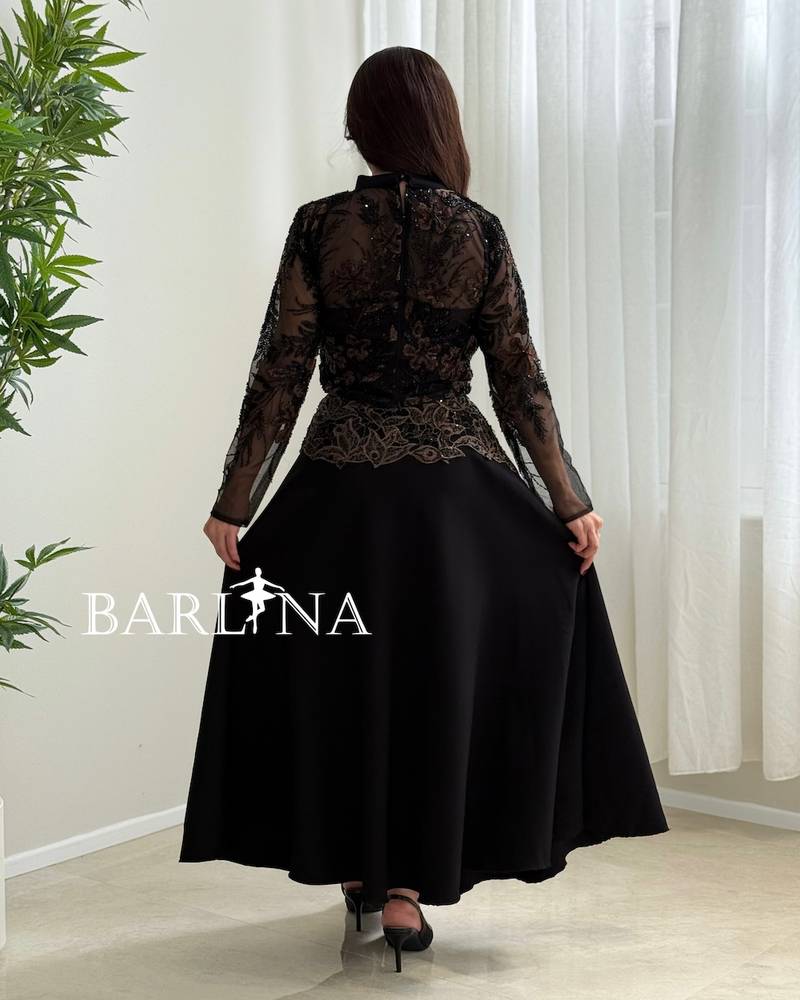 Black set with a high collar and gold embroidery