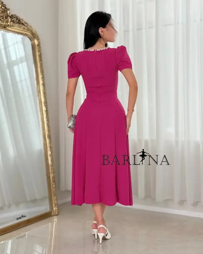 A soft dress with a sophisticated classic cut.