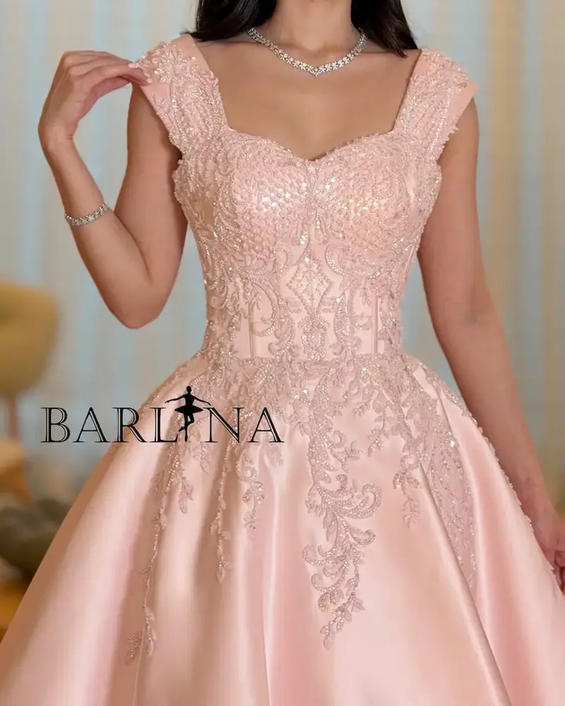Evening dress with a full skirt and elegant embroidery