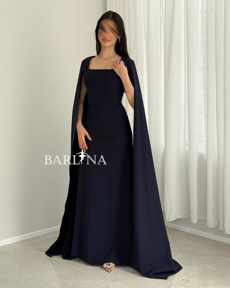 Long navy dress with flowing cape sleeves