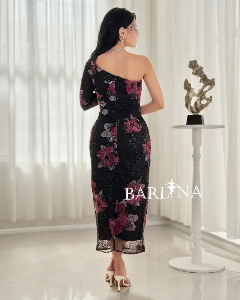 Black floral dress with one long sleeve