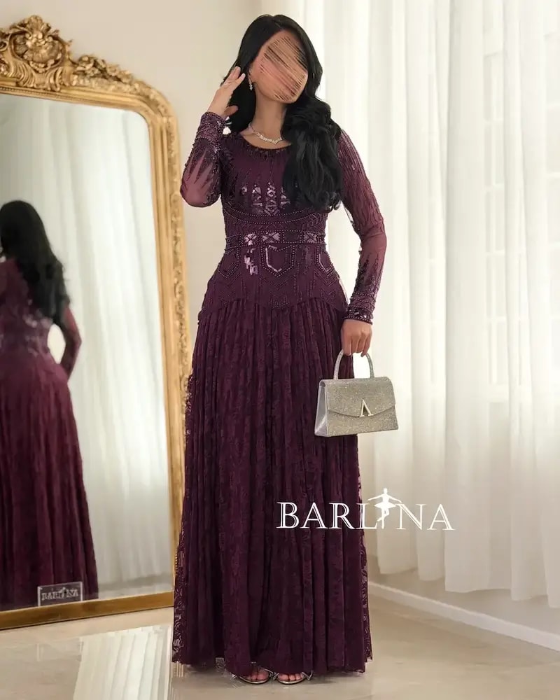 Lace evening dress with embroidered bodice