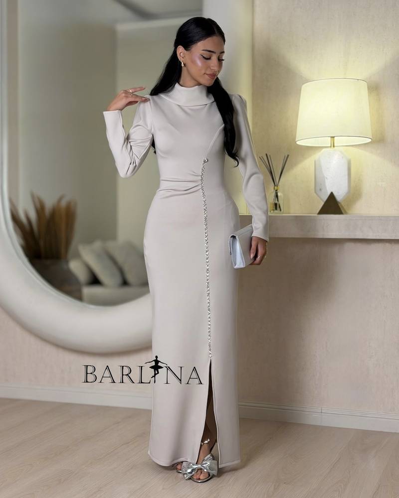 Off-white dress with a soft and elegant design