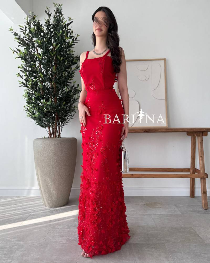 Long red dress embroidered with flowers