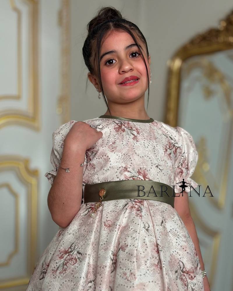 Creamy floral girl's dress with an olive belt