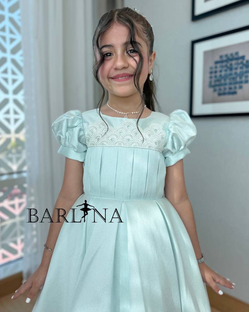 Light blue girly dress adorned with white lace trim
