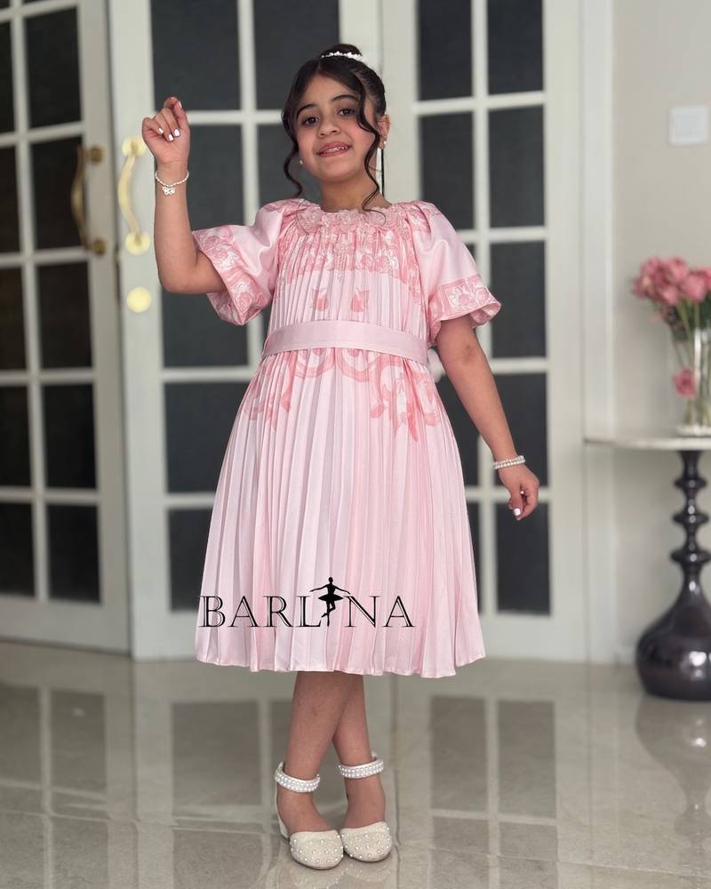 Soft pleated dress for girls with a wide cut