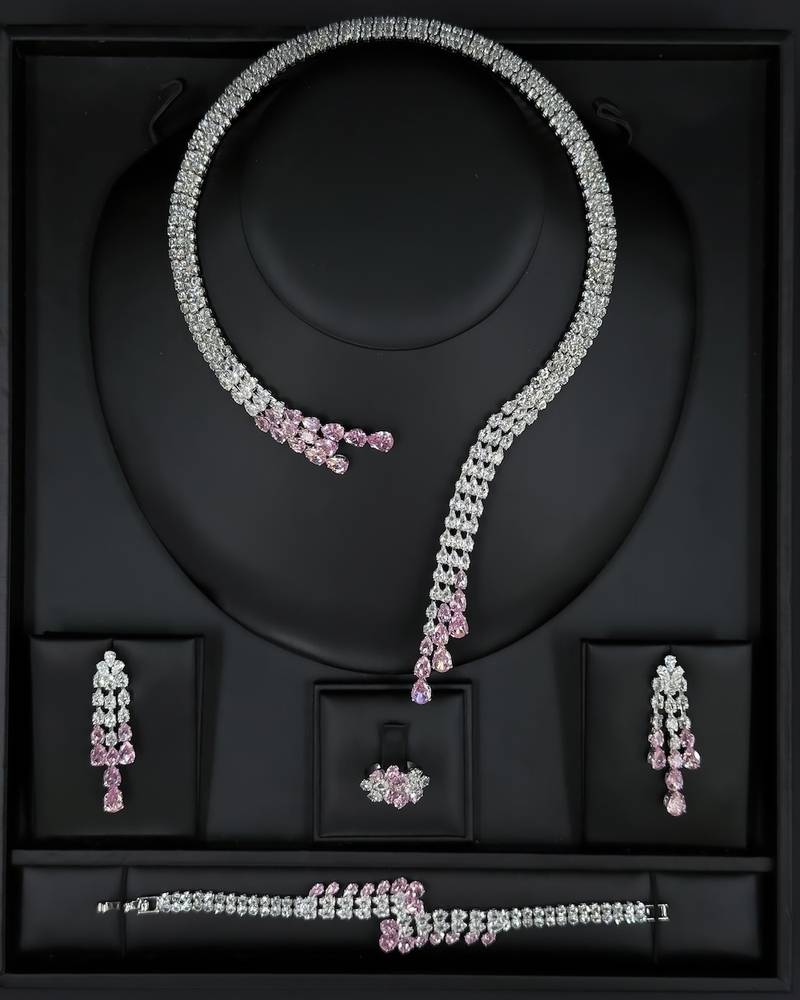 Modern accessory set with an open purple necklace