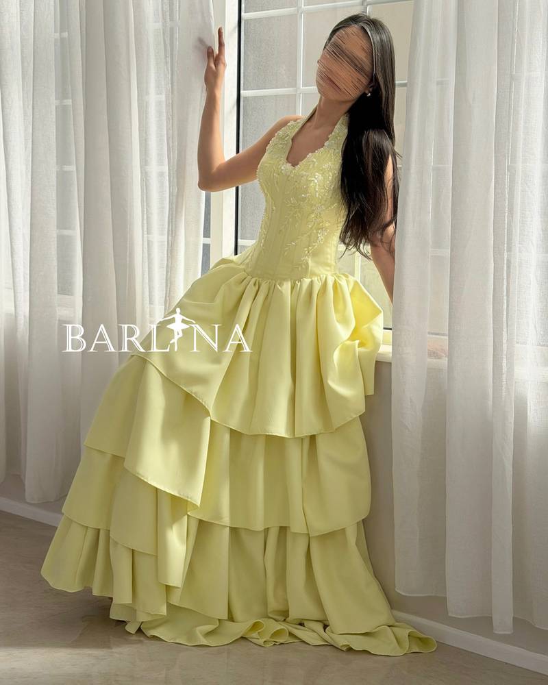 Yellow layered dress with embroidered corset