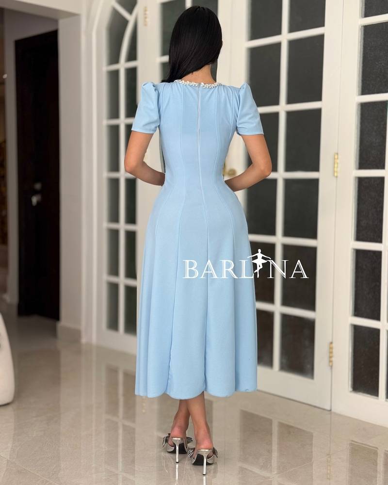 A soft dress with a sophisticated classic cut.