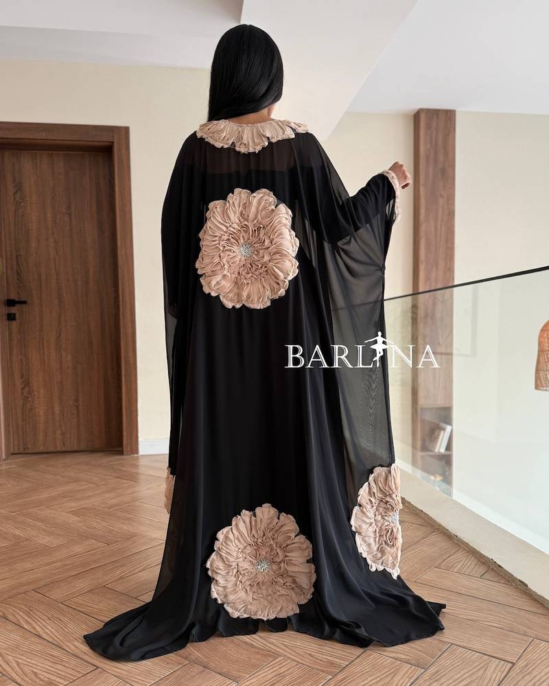 Soft black dress with a floral abaya