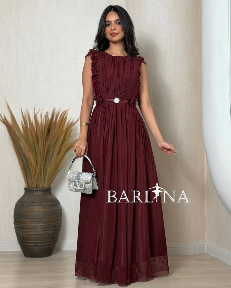 Long burgundy dress with soft pleats
