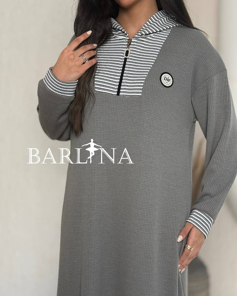 Long gray winter shirt decorated with a striped pattern