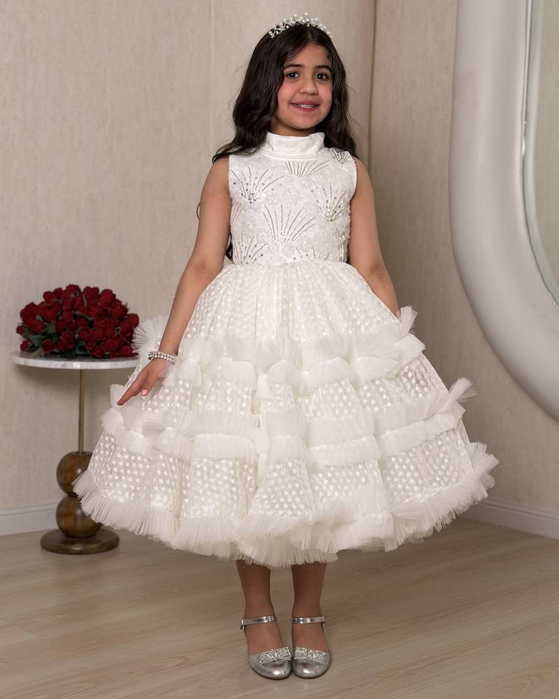 Royal white girl's dress with a wide design
