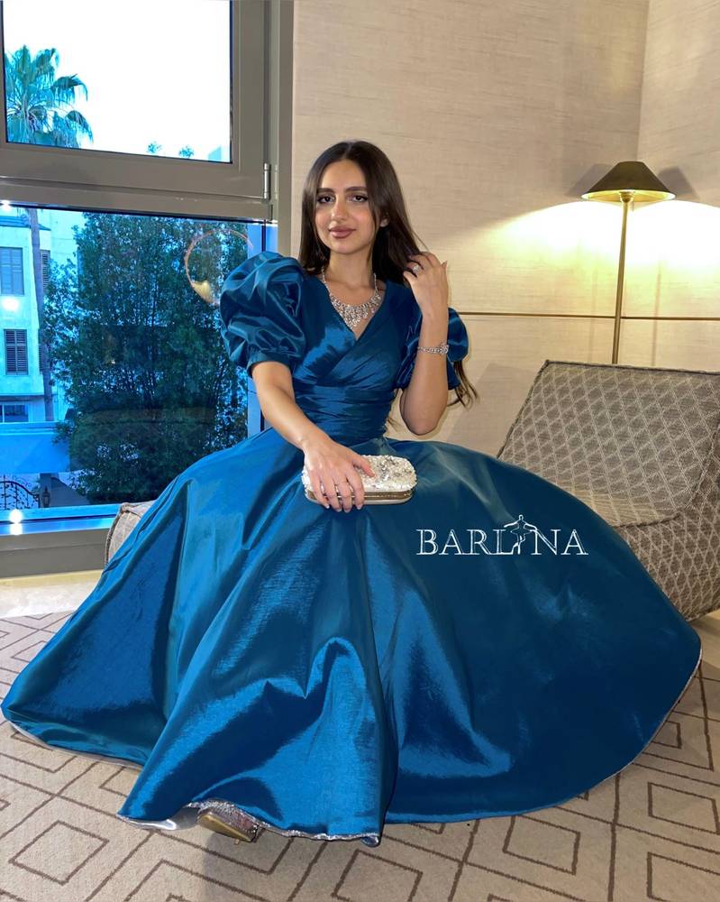 Blue midi dress with puff sleeves