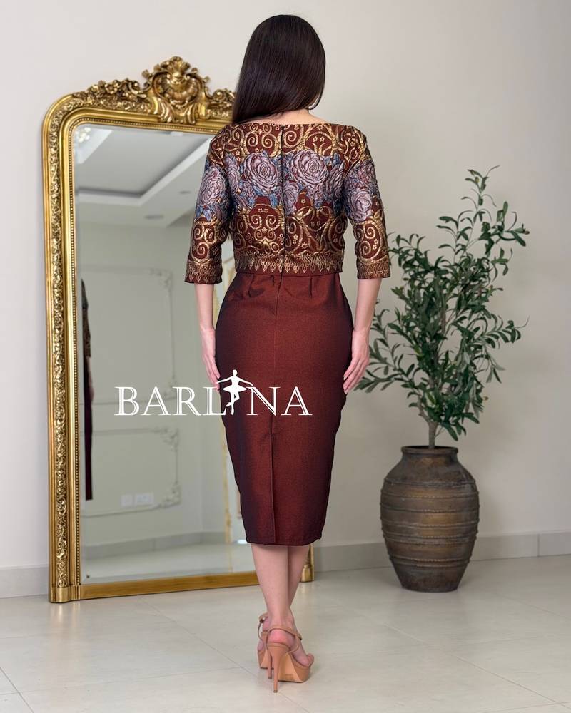 Black midi dress with a gold embroidered overlay