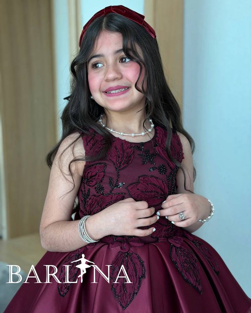 Girls' burgundy dress with a fluffy tulle overlay