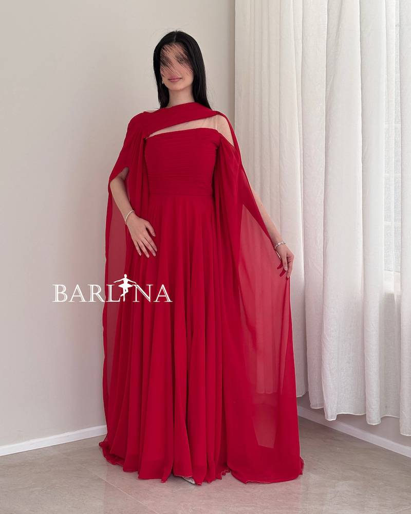 Long red dress with a soft design and a shawl