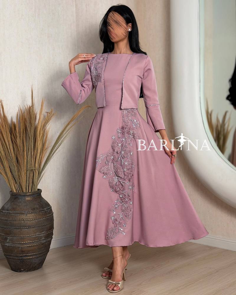 Pink dress with a short embroidered jacket